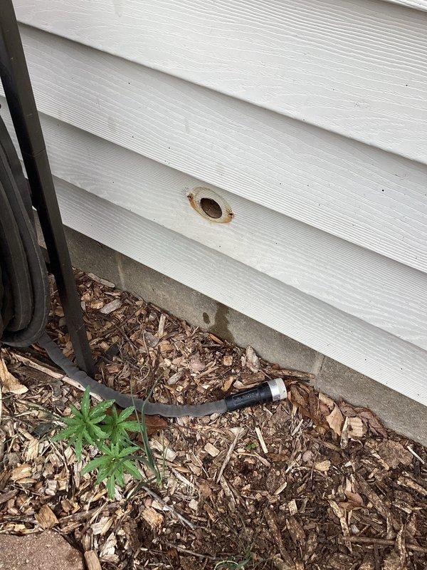 Replaced two exterior hose bibs (spigots) on the building's exterior wall, removing old fixtures and installing new frost-free sillcocks through the vinyl siding. Ensured proper sealing around wall penetrations to prevent water intrusion and verified operational functionality of both new fixtures upon completion.