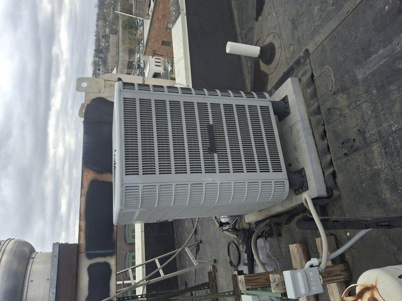 Returned to commercial rooftop location to pressurize the air conditioning system and perform leak detection procedures. Successfully pressurized the system and conducted thorough inspection of the rooftop HVAC unit, associated refrigerant lines, and condensate piping to identify source of refrigerant loss.