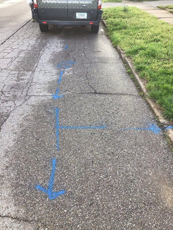 Completed main sewer line replacement from residence to street connection. Utility lines were marked and located prior to excavation, trench was cut through lawn and concrete walkway sections, and new sewer pipe was installed to code specifications. All disturbed surfaces including concrete pathway and lawn areas were restored upon completion of the installation.