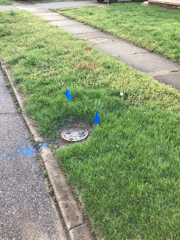 Completed main sewer line replacement from residence to street connection. Utility lines were marked and located prior to excavation, trench was cut through lawn and concrete walkway sections, and new sewer pipe was installed to code specifications. All disturbed surfaces including concrete pathway and lawn areas were restored upon completion of the installation.