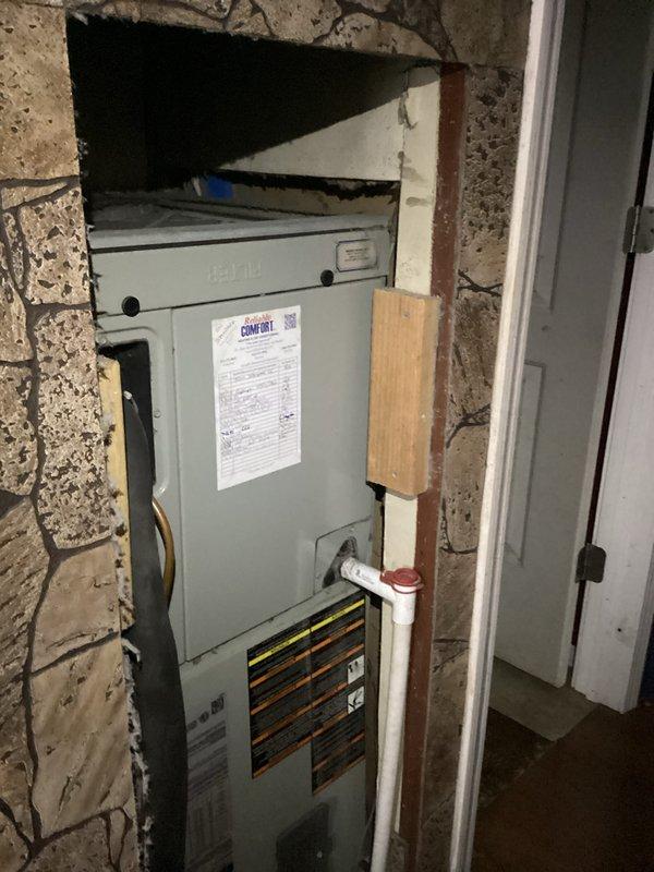 Completed comprehensive monthly heating maintenance on residential HVAC system. Performed thorough inspection of Comfort brand furnace unit located in basement utility area, checking all operational components, burner assembly, heat exchanger, and safety controls. Verified proper furnace operation and airflow throughout system. Inspected outdoor condenser unit positioned on pad adjacent to building, confirming secure mounting, proper clearances, and overall equipment condition. Replaced 20x20x1 air filter as part of standard maintenance protocol. All equipment found to be operating within normal parameters with no immediate service concerns identified. System ready for continued heating season operation.