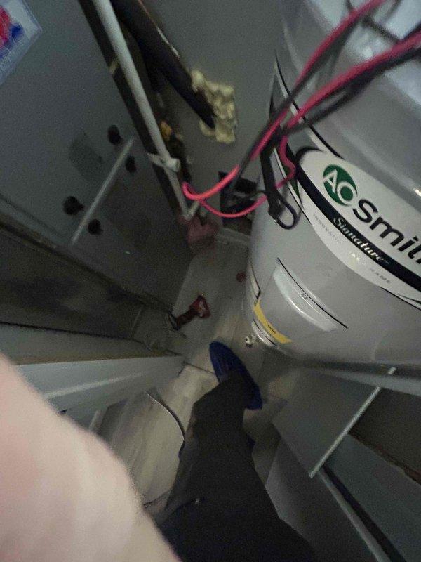 Completed comprehensive heating and cooling system tune-up and preventative maintenance inspection. Verified operation of Honeywell thermostat controls and confirmed proper communication between thermostat and HVAC equipment. Inspected mechanical room equipment including AO Smith water heater, electrical connections, and associated plumbing infrastructure to ensure all systems operating within normal parameters.