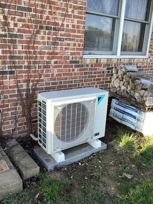 Completed warranty replacement of compressor and outdoor circuit board on Daikin residential heat pump unit. System tested and confirmed operational following component installation.