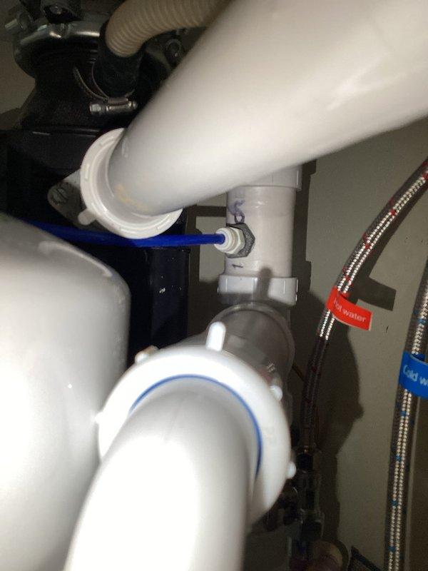 Responded to kitchen plumbing misalignment following new countertop and sink installation. Assessed existing drain configuration and determined PVC piping modifications were required to properly connect the drainage system, as original pipes no longer aligned with new fixture placement. Documented under-sink plumbing assembly including P-trap configuration, garbage disposal connections, and supply lines for estimate preparation.