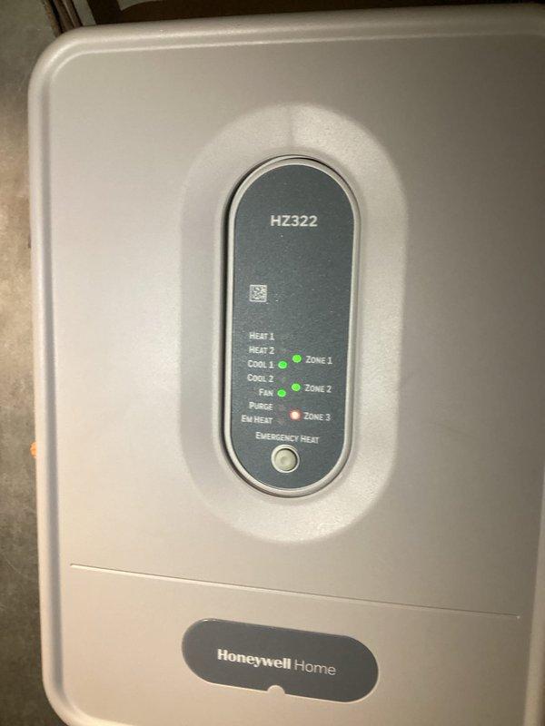 Responded to callback for unit not operating properly following previous repair. Inspected American Standard air handler and Honeywell HZ322 zone control system. Diagnosed issue with zone controller operation affecting cooling functionality. Corrected system malfunction, verified proper operation of all three zones with appropriate indicator lights functioning, and confirmed unit returned to normal cooling operation. Office waived trip fee due to nature of callback.