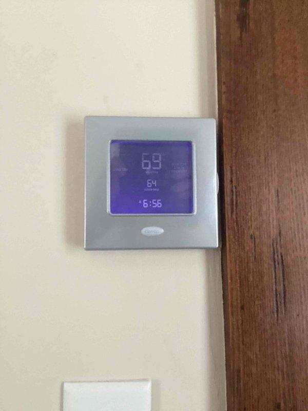 Completed basic monthly heating maintenance on dual Carrier heat pump systems. Performed routine inspection of both indoor and outdoor units, verified thermostat operation and temperature settings, checked refrigerant line connections and electrical disconnect, and replaced two 14x14x1 air filters. Both systems operating normally with no deficiencies noted.