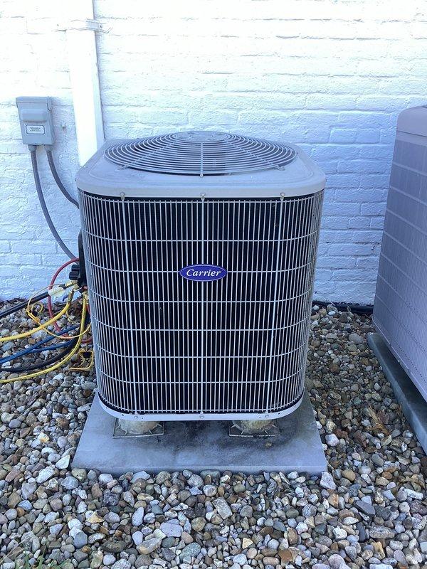 Completed basic monthly heating maintenance on dual Carrier heat pump systems. Performed routine inspection of both indoor and outdoor units, verified thermostat operation and temperature settings, checked refrigerant line connections and electrical disconnect, and replaced two 14x14x1 air filters. Both systems operating normally with no deficiencies noted.