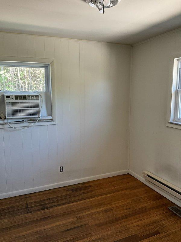 Conducted on-site evaluation for heat pump system installation at residential property currently equipped with electric baseboard heating. Assessed interior spaces, existing electrical infrastructure, and structural considerations for transitioning from baseboard heat to a heat pump HVAC system. Documented current heating configuration and identified suitable locations for indoor air handler placement and outdoor condensing unit installation to provide both heating and cooling capabilities.