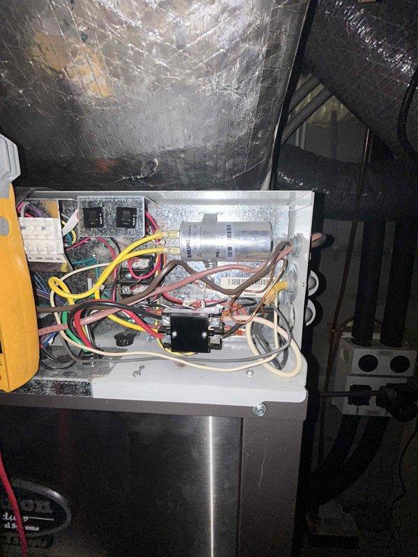 Responded to no-heat call on furnace system located in breezeway. Upon arrival, performed diagnostic testing of electrical components including control board, relays, and capacitor using multimeter. Inspected internal wiring connections, safety controls, and ignition system to identify cause of system failure and restored unit to proper operation.