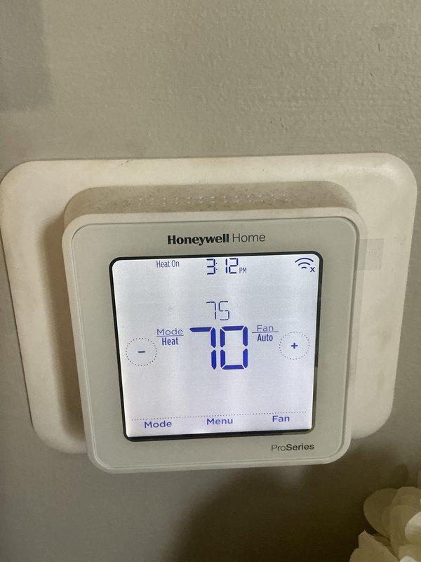 Completed comprehensive heating maintenance on natural gas furnace system. Performed combustion analysis with readings showing 6.2% O₂ and 39 ppm CO, indicating proper burner operation. Verified thermostat functionality with system actively heating and maintaining setpoint at 70°F in heat mode with auto fan operation. Filter size was documented for future service reference as it was previously unknown.