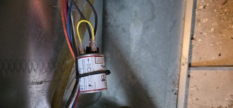 Responded to no heating/cooling complaint with reported plastic smell following previous service visit. Upon arrival, inspected Honeywell ProSeries programmable thermostat and traced wiring to HVAC system components. Examined transformer and associated low-voltage wiring connections between ductwork, verifying proper wire terminations and checking for signs of overheating or damaged insulation that could produce odor. System was found in off position at time of inspection, requiring further diagnostic work scheduled for follow-up appointment to identify root cause of complete system failure and odor concern.