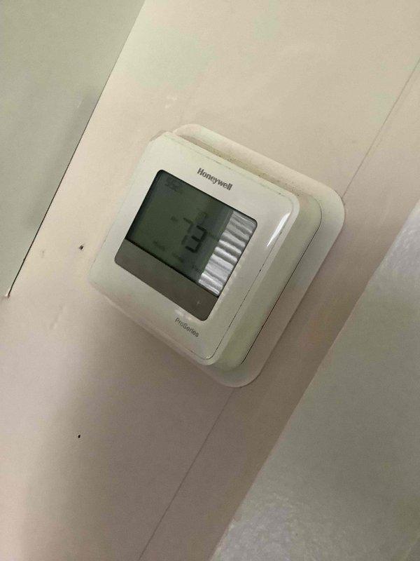 Completed monthly maintenance service on two HVAC cooling systems at duplex property. Performed comprehensive system inspections including refrigerant pressure testing using manifold gauge set on outdoor condenser units, verified proper operating pressures and system performance. Replaced two 16x25x1 air filters, confirmed thermostat operation displaying 73°F, and inspected condenser coil fins for proper airflow.