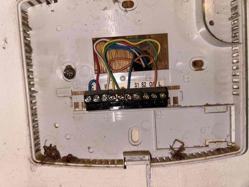 Responded to no cooling call on residential air conditioning system. Upon arrival, found AC unit completely inoperative with no power to system. Performed electrical diagnostics at main panel using digital multimeter to verify circuit integrity and voltage supply. Inspected thermostat wiring and terminal connections, checking all low-voltage connections including R, C, Y, G, and W terminals for proper contact and continuity. Identified and resolved power supply issue preventing system operation. Verified proper voltage at disconnect and confirmed all safety controls functioning correctly. System restored to normal operation with adequate cooling capacity confirmed.