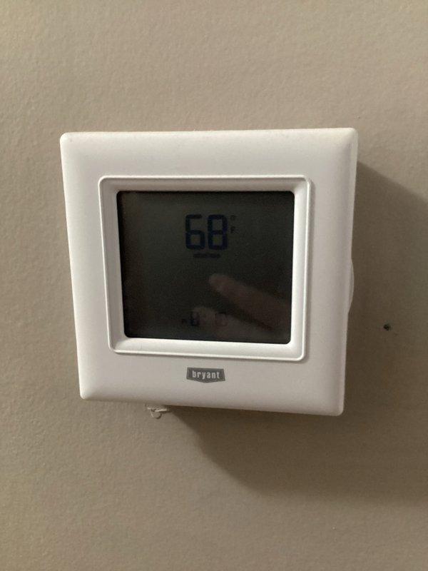 Responded to no cooling call at residential property. Upon arrival, found Bryant thermostat displaying 68°F but system not providing cooling. Performed diagnostic assessment of HVAC system and documented equipment conditions with photographs. Inspected thermostat operation and verified settings, then assessed overall system functionality to determine cause of cooling failure and provide repair recommendations to restore proper operation.