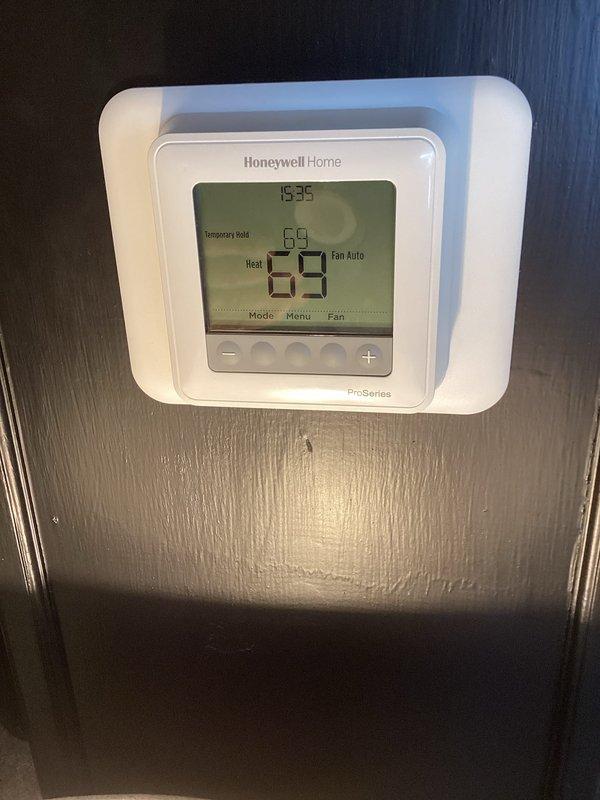 Completed basic monthly heating maintenance on HVAC system. Inspected blower wheel assembly and verified proper operation, checked Honeywell ProSeries thermostat functioning correctly in heat mode at 69 degrees with fan set to auto. System operating within normal parameters.