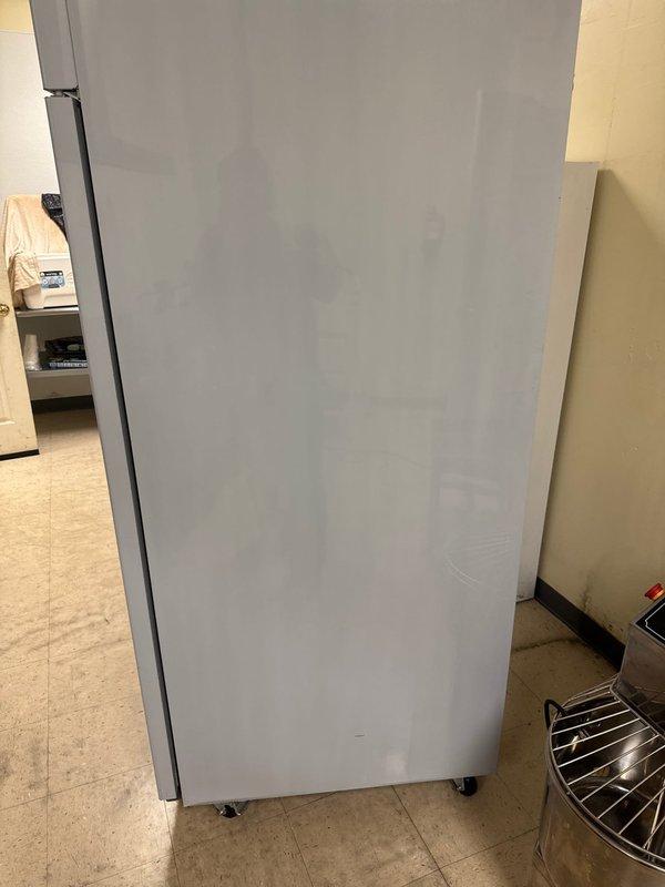 Responded to service call regarding malfunctioning kitchen exhaust fan system producing abnormal noise. Upon arrival, inspected VIKIO brand stainless steel chimney-style range hood previously installed in 2024. Conducted diagnostic assessment of ventilation unit, control panel, and ductwork extending through ceiling. Documented current condition of exhaust system and surrounding kitchen appliances with photographic evidence for warranty verification purposes.