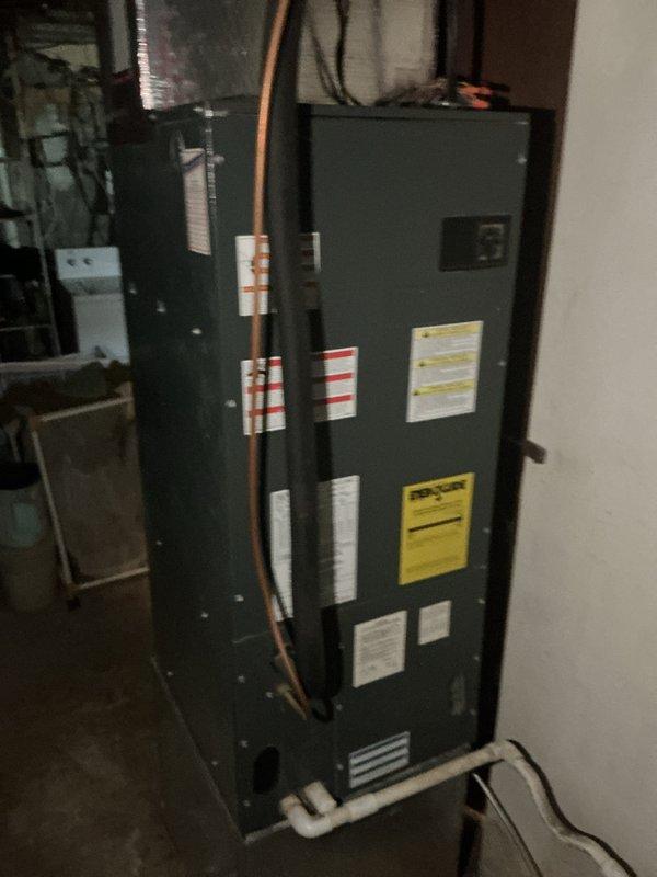 Completed scheduled heating maintenance on HVAC air handler system located in basement utility area. Performed standard system inspection, replaced 20x25x1 air filter per monthly maintenance agreement, and provided customer with equipment age information from manufacturer data plate on unit. All system components operating within normal parameters at time of service.