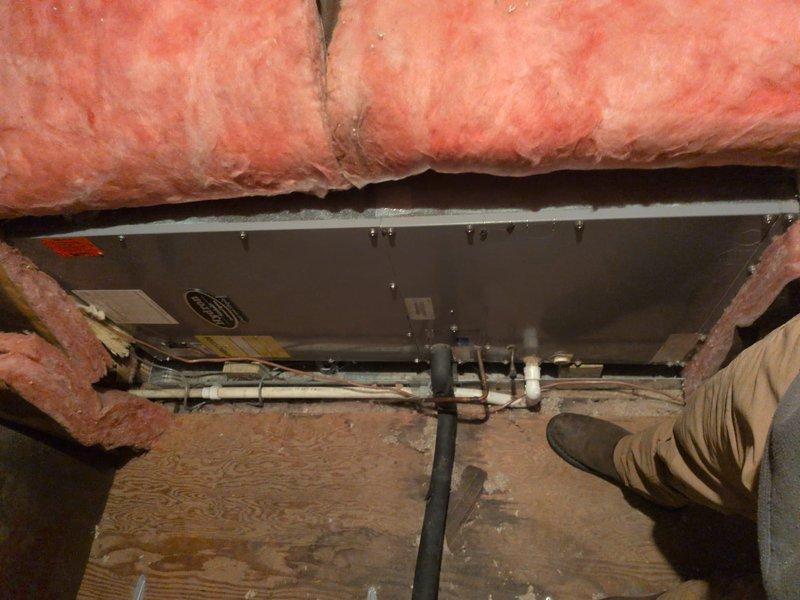 Completed basic monthly heating maintenance visit on two HVAC systems. Inspected attic-mounted unit, verifying proper operation of heating components, refrigerant lines, and drainage connections. Confirmed Hydron thermostat displaying accurate temperature readings and responding properly to system calls, with unit maintaining setpoint at 69°F.