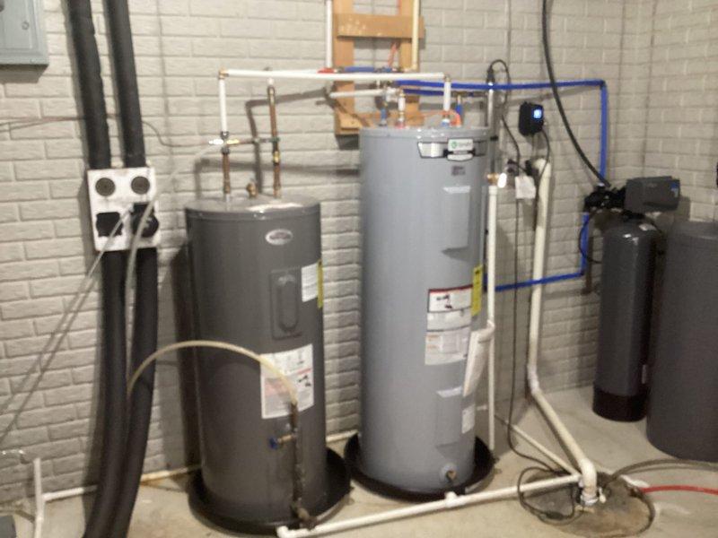 Completed routine HVAC maintenance on heating system as part of monthly service agreement. Replaced air filter with 15.50x24.50x3.75 unit to maintain proper airflow and system efficiency. Inspected mechanical room equipment including OceanLINK Flow Center hydronic control system, water heaters, expansion tank, and associated piping infrastructure. All components operating within normal parameters with no immediate service needs identified. Documentation photos captured for service records.