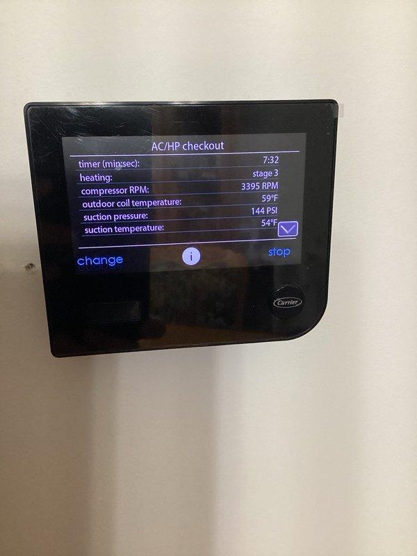 Responded to fault code 83 low pressure lockout on Carrier heat pump system. Cleared the 4-hour lockout that occurred at 03:27AM and performed AC/HP checkout diagnostics, confirming system operation with compressor running at 3395 RPM, suction pressure at 144 PSI, suction temperature at 54°F, and outdoor coil temperature at 59°F. System returned to normal operation after diagnostic testing.