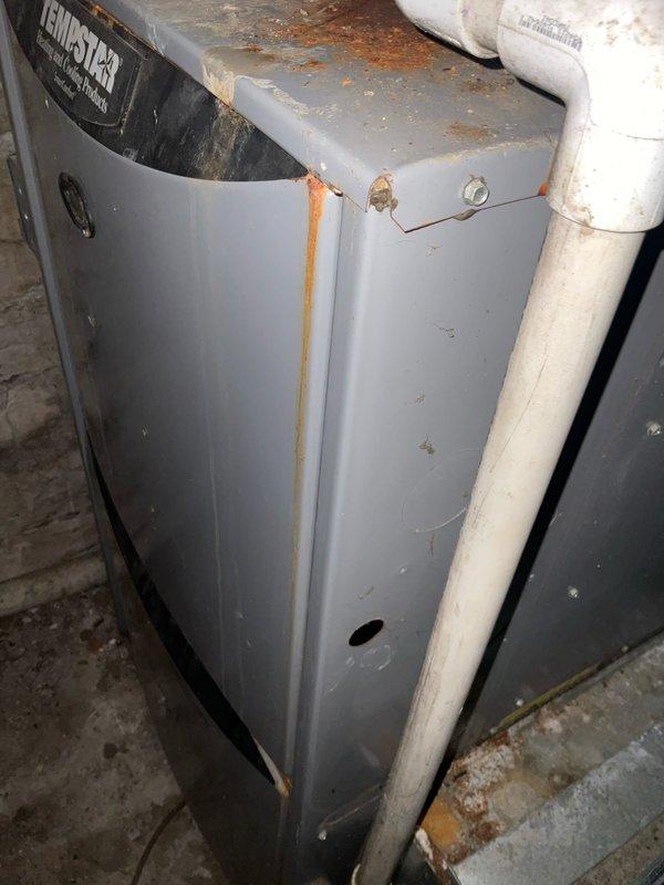 Conducted comprehensive replacement estimate for existing 3-ton heat pump and 96% efficiency furnace dual-fuel system showing significant age-related deterioration, including extensive rust corrosion on cabinet panels and moisture damage throughout equipment. Assessed customer requirements for mid-tier replacement equipment with 5-year service expectancy, provided multiple system options with promotional incentives and extended labor warranty coverage, and documented current installation configuration in basement mechanical room including ductwork layout and existing infrastructure conditions for accurate proposal preparation.