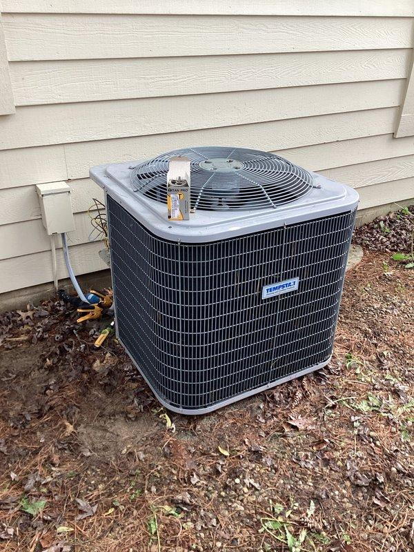 Responded to no cooling complaint on residential air conditioning system. Upon arrival, performed diagnostic inspection of outdoor condenser unit and indoor air handler components. Verified unit specifications and conducted visual assessment of refrigerant lines, electrical connections, and overall system condition. Inspected air filter at indoor unit and confirmed proper airflow pathway. Documented equipment condition through photographs showing condenser unit with intact coil fins, proper line set installation, and mounted electrical disconnect. System evaluated and customer advised of findings.