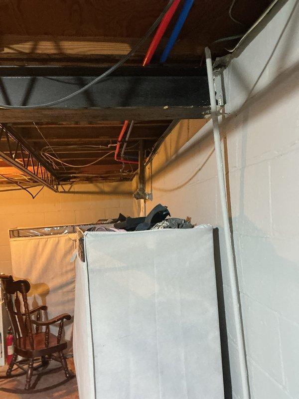 Deployed two licensed plumbers to complete waterline installation and commercial faucet setup in basement utility area. Routed new supply lines through existing infrastructure alongside HVAC ductwork and electrical conduits, securing connections to meet code requirements. Successfully installed commercial-grade faucet fixture with proper shutoff valves and tested all connections for leaks and proper water pressure upon completion.