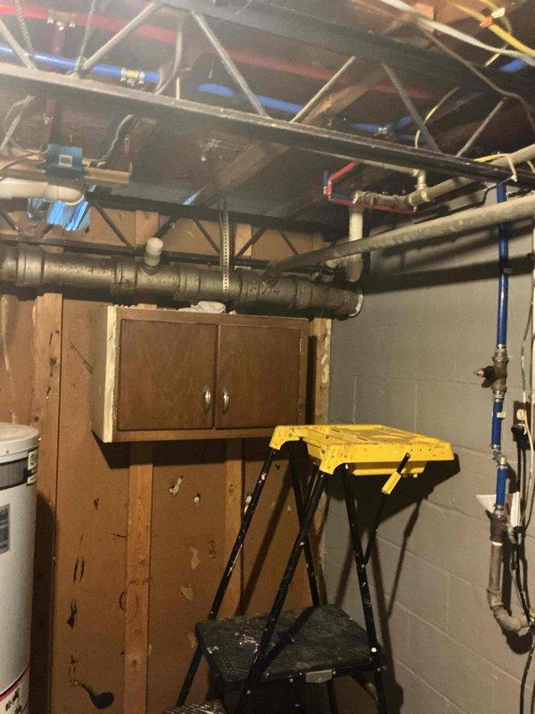 Deployed two licensed plumbers to complete waterline installation and commercial faucet setup in basement utility area. Routed new supply lines through existing infrastructure alongside HVAC ductwork and electrical conduits, securing connections to meet code requirements. Successfully installed commercial-grade faucet fixture with proper shutoff valves and tested all connections for leaks and proper water pressure upon completion.