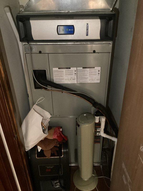 Responded to no-cooling complaint on residential air conditioning system. Upon arrival, performed diagnostic evaluation of split HVAC system consisting of indoor air handler with integrated furnace and outdoor condensing unit. Inspected both indoor and outdoor components, documented system configuration and current operating condition through visual assessment. System evaluation completed to identify cause of cooling failure and determine necessary corrective action.