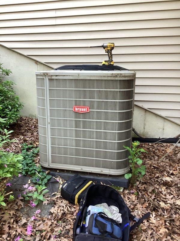 Responded to a no-cooling call on a Bryant residential air conditioning system. Upon arrival, found the thermostat displaying 73°F room temperature with system calling for cooling mode. Performed diagnostic inspection of the outdoor condenser unit, which showed normal physical condition with clean coil fins and secure mounting. Conducted electrical testing and operational assessment of the condensing unit to identify the cause of cooling failure and restored system to proper working order.