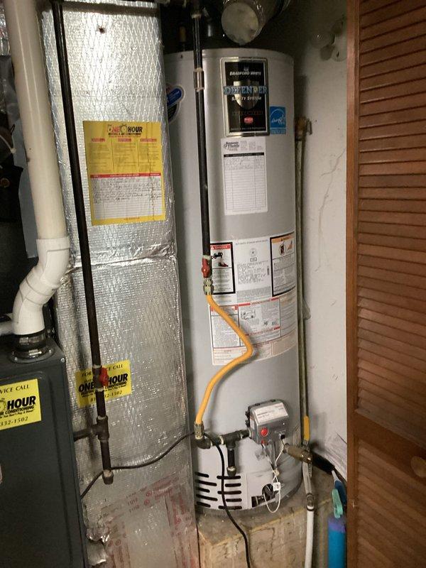 Responded to cooling complaint where system was unable to maintain setpoint of 63-65°F with indoor temperature rising to 72°F and above. Upon arrival, verified thermostat was set to cooling mode with fan on auto, displaying indoor temperature of 77°F with cooling setpoint of 67°F. Inspected HVAC equipment including furnace with air handler and associated components in utility area. System evaluated for proper operation and temperature differential.