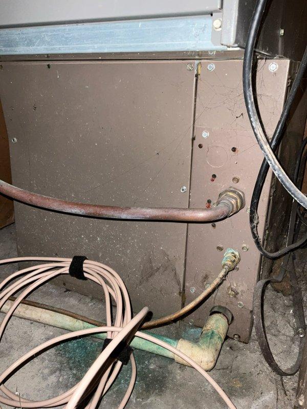 Conducted comprehensive on-site assessment for duct cleaning estimate at residential property. Inspected HVAC system components in mechanical space, including furnace installation, refrigerant lines, and associated ductwork distribution throughout home. Photographed existing system configuration, noting copper line conditions and current air distribution setup serving multiple rooms via ceiling-mounted supply registers.