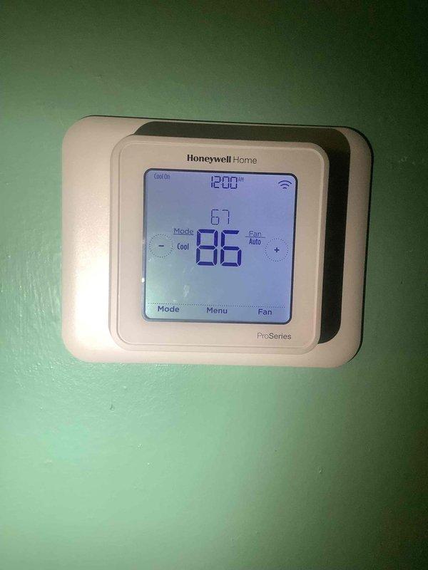 Performed warranty diagnostics on HVAC system using manifold gauges and digital diagnostic equipment to assess system performance and refrigerant pressures. Verified thermostat operation and confirmed cooling mode functionality with proper communication between Honeywell ProSeries Wi-Fi thermostat and air handler. System tested and operating within normal parameters under warranty coverage.