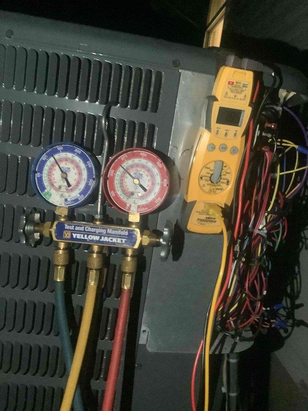 Performed warranty diagnostics on HVAC system using manifold gauges and digital diagnostic equipment to assess system performance and refrigerant pressures. Verified thermostat operation and confirmed cooling mode functionality with proper communication between Honeywell ProSeries Wi-Fi thermostat and air handler. System tested and operating within normal parameters under warranty coverage.