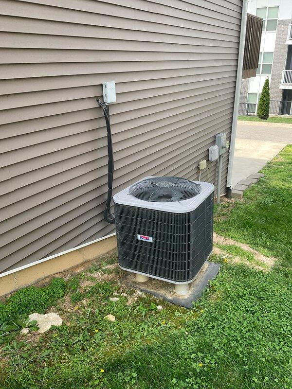 Conducted comprehensive site evaluation for complete heat pump system replacement at 2-bedroom residential townhouse. Assessed existing outdoor condensing unit mounted on concrete pad with proper clearance from building exterior, electrical disconnect, and conduit installation. Evaluated basement-mounted air handler unit with PVC condensate drainage, ductwork with reflective insulation, and adjacent water heater for spatial planning and compatibility considerations. Documented current equipment specifications, installation configuration, electrical connections, and mechanical room layout to provide accurate replacement system sizing and installation proposal for dual heating and cooling capacity heat pump system.