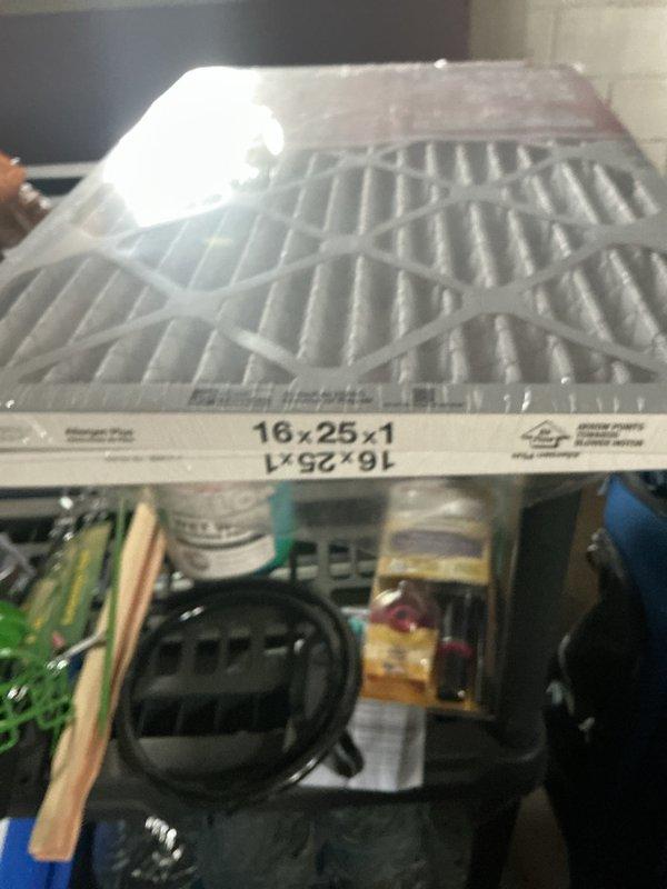 Completed cooling system maintenance on Trane HVAC unit in basement mechanical room. Identified and documented air filter size as 16x25x1, which was previously unknown in system records. Replaced air filter and verified proper airflow through unit. System operational and ready for cooling season.