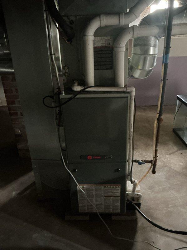 Completed cooling system maintenance on Trane HVAC unit in basement mechanical room. Identified and documented air filter size as 16x25x1, which was previously unknown in system records. Replaced air filter and verified proper airflow through unit. System operational and ready for cooling season.