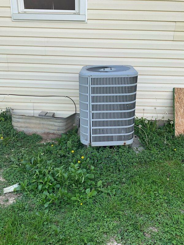 Responded to service call for 2012 Duncane heat pump system with confirmed R410A refrigerant leak at evaporator coil. Performed system evaluation and documented existing equipment configuration including indoor air handler unit and outdoor condenser unit. Provided comprehensive estimate for complete HVAC system replacement due to non-repairable leak in evaporator coil, with customer requesting expedited installation timeline within one week.