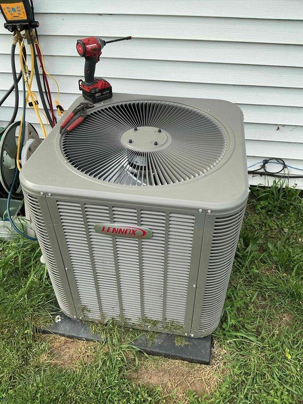 Completed routine spring maintenance visit on residential HVAC system including Lennox outdoor condensing unit and Sensi digital thermostat. Performed standard preventive maintenance procedures on both cooling and heating components, utilized diagnostic gauges to verify proper refrigerant pressures and system operation, and confirmed thermostat functionality with temperature reading at 73 degrees.