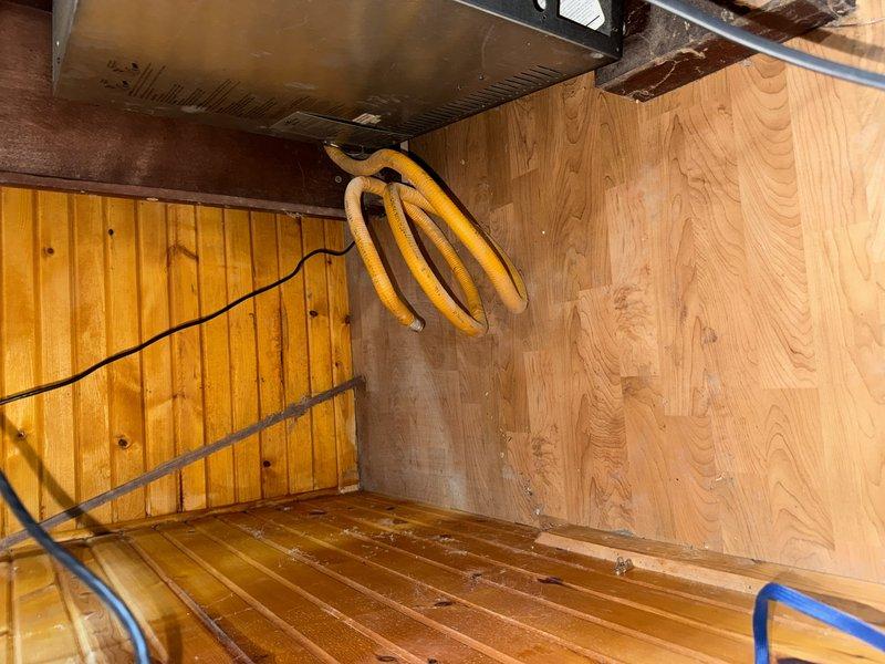 Replaced exterior brass hose bib mounted on brick wall with new frost-free spigot, ensuring proper installation and secure mounting. Removed approximately 10 feet of flexible yellow gas line from interior crawl space, disconnecting and capping gas connection points in accordance with safety protocols.