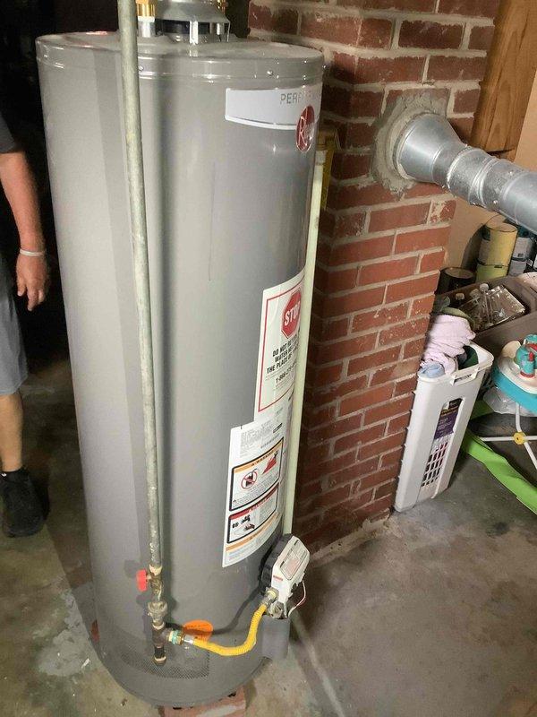 Completed CCC Basic Monthly maintenance on residential cooling system. Performed standard inspection of outdoor condensing unit, connected manifold gauges to service ports to verify refrigerant pressures and system operation, and inspected indoor air handling equipment including water heater in basement utility area. System requires 16x25x4 filter replacement by customer as filters are not included in this service plan.