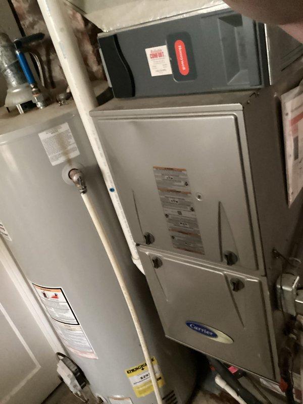 # HVAC Maintenance - Cooling System Service

Completed basic monthly cooling maintenance visit on residential Carrier HVAC system. Performed standard inspection of indoor furnace unit located in mechanical room and outdoor condensing unit positioned on exterior concrete pad. Inspected all accessible components including electrical connections, refrigerant lines, condensate drainage system, and operational controls. Verified proper operation of both indoor and outdoor equipment. Checked condenser unit exterior condition, fan operation, and electrical disconnect box. Examined indoor unit cabinet, associated PVC drainage piping, and mechanical connections. System found to be operating within normal parameters. Customer was informed that 16x25x4 air filter is not included in basic monthly service and should be maintained separately.