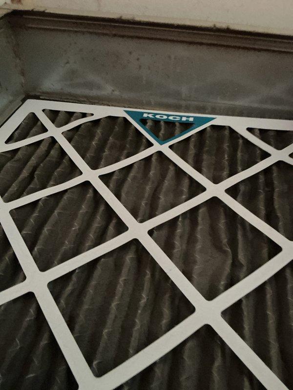 Completed comprehensive cooling maintenance service on residential HVAC system before 2 PM deadline. Performed Basic Plus cooling maintenance protocol, which included inspecting and servicing the outdoor condenser unit with visible service gauges attached for diagnostic testing, and inspecting the air filtration system equipped with a 20x20x4 pleated KOCH filter showing moderate dust accumulation. All maintenance tasks completed per service agreement specifications.