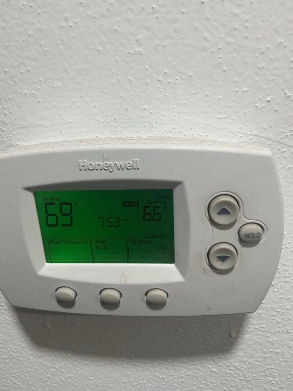 Completed basic monthly cooling maintenance on residential HVAC system. Inspected thermostat operation showing proper temperature control and system cycling, verified furnace/air handler unit condition, and documented equipment status. Customer advised that 16x20x4 filter is not included in service and requires separate provision.