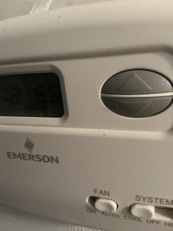 Completed cooling maintenance on residential air conditioning system with expired service agreement. Performed standard inspection of outdoor condenser unit and indoor thermostat controls, documented equipment condition with photos showing Emerson thermostat and exterior condensing unit in operational status. Unable to verify air filter status during this service visit.