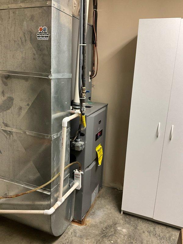 Completed estimate for replacement of 23-year-old 5-ton air conditioning system. Evaluated existing indoor air handler unit and ductwork configuration in utility space. Customer expressed interest in upgrading to Trane equipment and considering heat pump option for increased energy efficiency and year-round comfort. Documented current system setup including air handler, ductwork assembly, refrigerant lines, condensate drainage, and electrical connections to provide accurate replacement specifications and equipment recommendations.