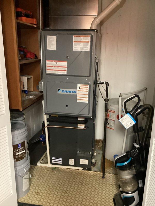 Performed cleaning and inspection on Daikin air conditioning system located in basement utility room. Completed standard tune-up procedures and assessed unit operation. Provided customer with pricing information for air filter replacement service.