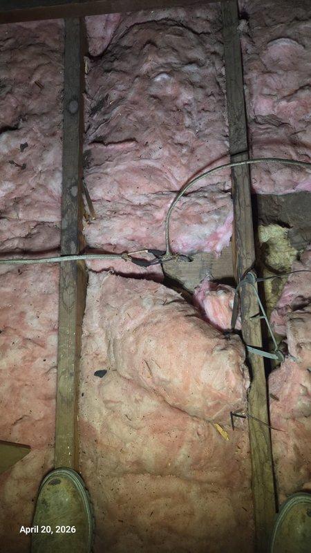 Completed electrical punch list work including installation and wiring of ceiling fan by repurposing existing exterior flood light circuit and switch. Installed four weatherproof outlet boxes in basement with new three-prong receptacles, relocated one outlet to water heater area to provide proper power for sump pump and water softener. Corrected improperly connected junction box in attic as noted by inspector, ensuring code compliance with proper electrical connections and securing.