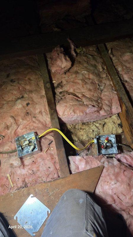 Completed electrical punch list work including installation and wiring of ceiling fan by repurposing existing exterior flood light circuit and switch. Installed four weatherproof outlet boxes in basement with new three-prong receptacles, relocated one outlet to water heater area to provide proper power for sump pump and water softener. Corrected improperly connected junction box in attic as noted by inspector, ensuring code compliance with proper electrical connections and securing.