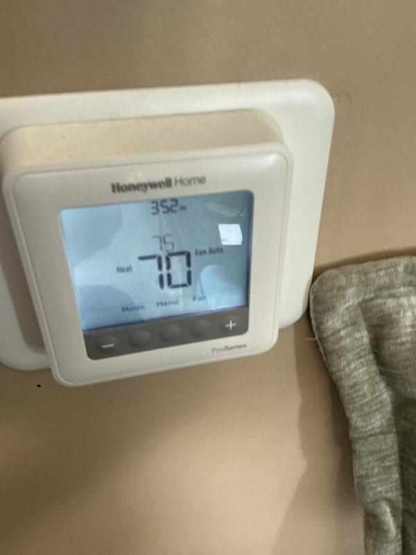 Completed annual heating maintenance visit on residential HVAC system. Performed comprehensive inspection of heating components, verified thermostat operation showing 73°F setpoint with proper display functionality, and examined internal mechanical equipment including ductwork and wiring connections. Customer's comfort club membership has expired but service was owed; noted that 20x20x4 filter is not included in maintenance plan and would require separate purchase if replacement is needed.